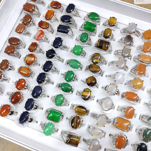 A Variety Of Natural Stone Rings Hand Jewelry