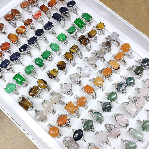 A Variety Of Natural Stone Rings Hand Jewelry